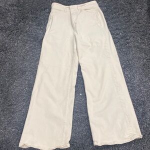 Cream wide leg high rise jeans.by Ann Taylor